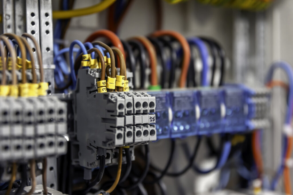 electrical panel with fuses and contactors, close up.